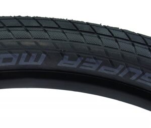 Schwalbe Super Moto-X Performance SnakeSkin Tire - Moto-X 27.5x2.4 Perf SS BK/BSK Dual Gn-Compound E50 Wire